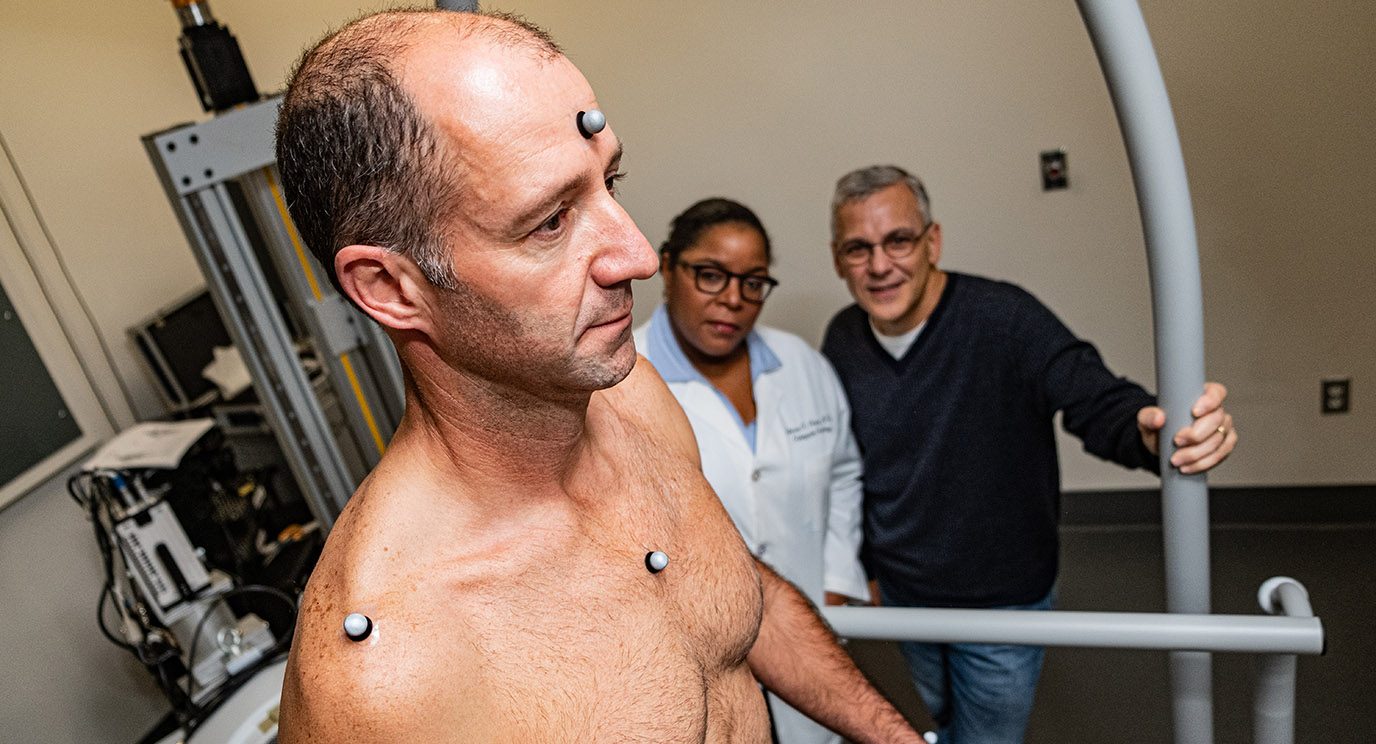 Physical therapist Alexander Penny is wired with motion capture technology.