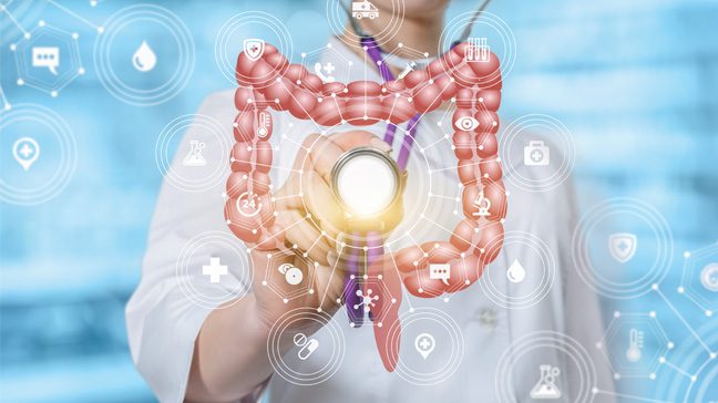 CGI of doctor in lab coat examining floating digital colon