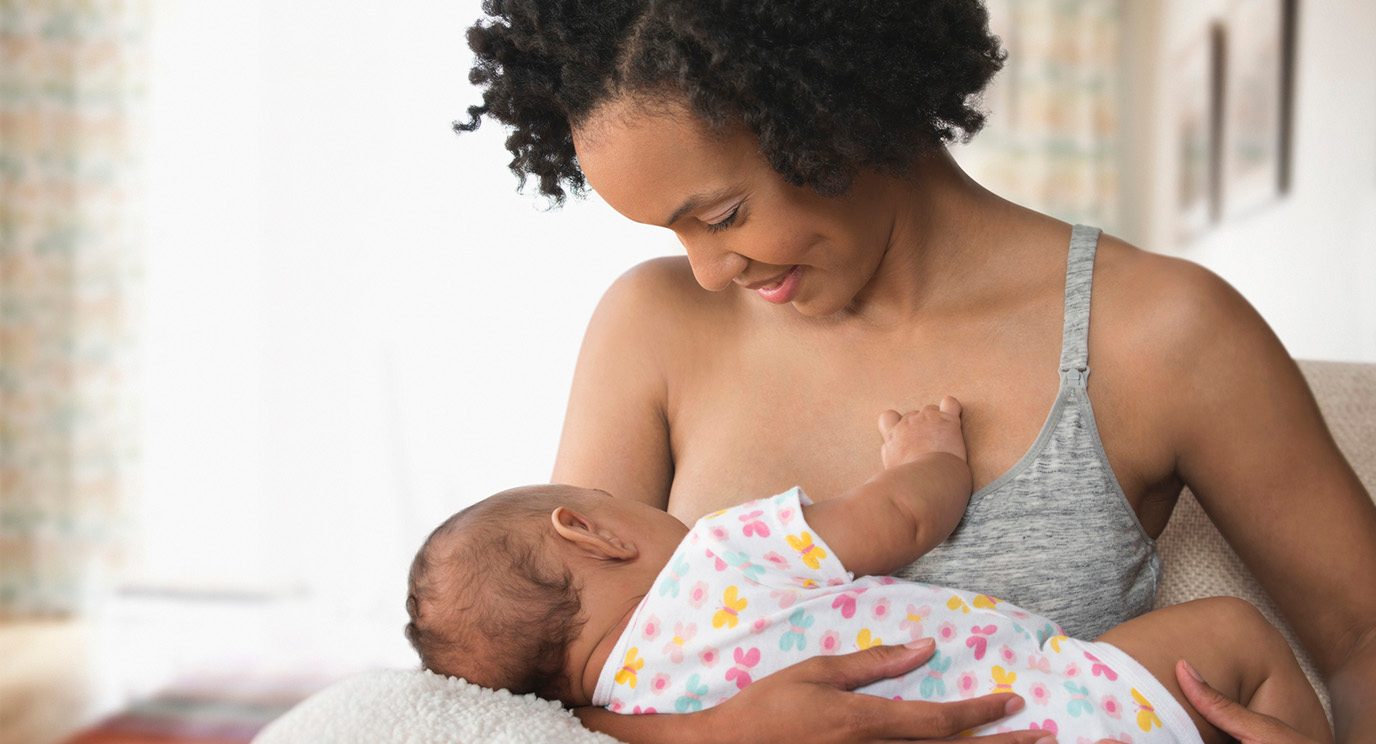 Woman breastfeeding baby