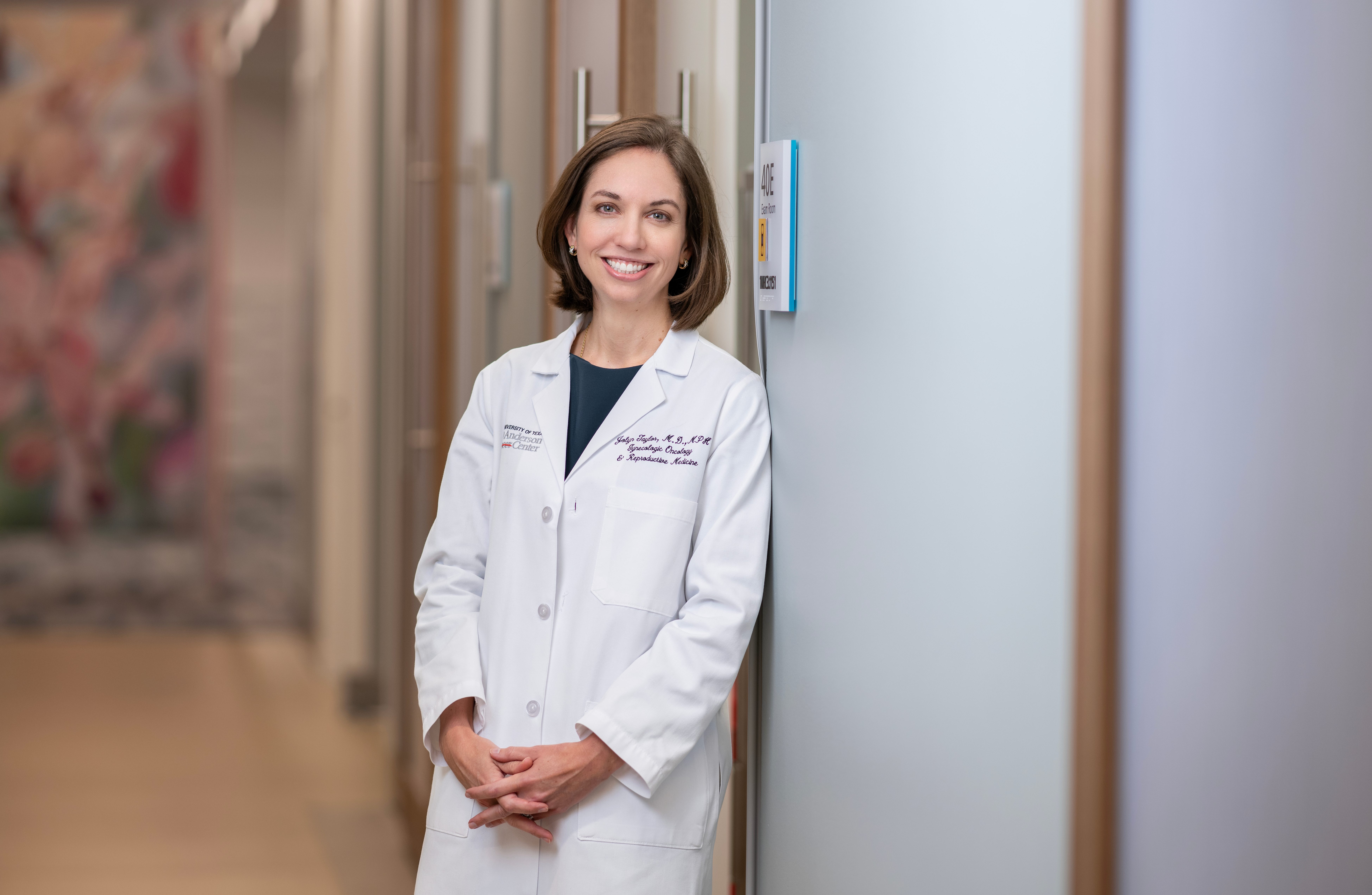 Dr. Jolyn Taylor standing in the hallway at MD Anderson