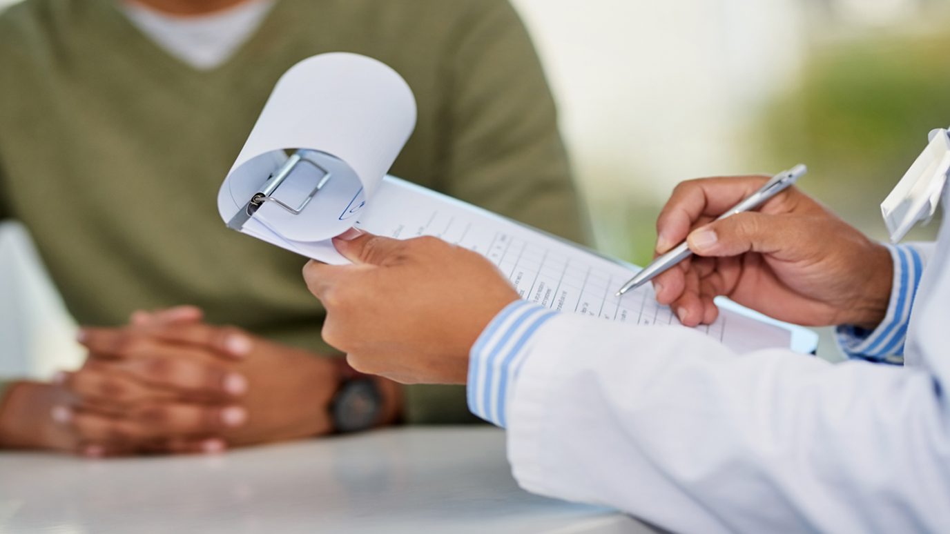 Patient and doctor meeting to discuss care. 