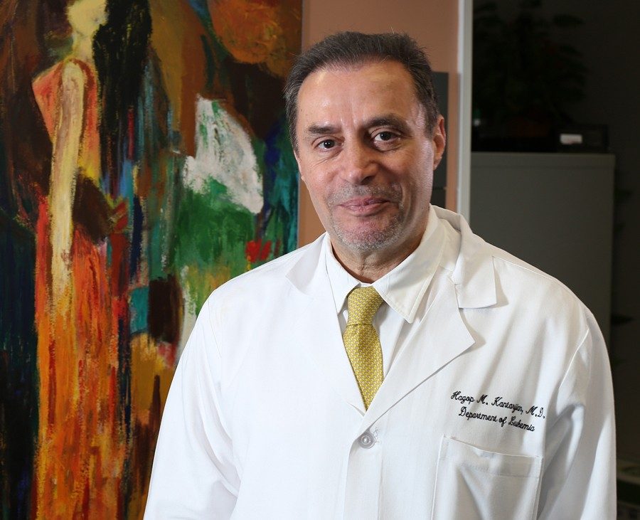 Hagop Kantarjian, M.D., with one of his paintings