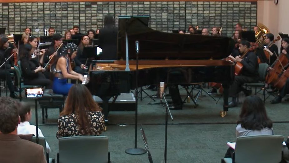 Dr. Mei Rui playing piano