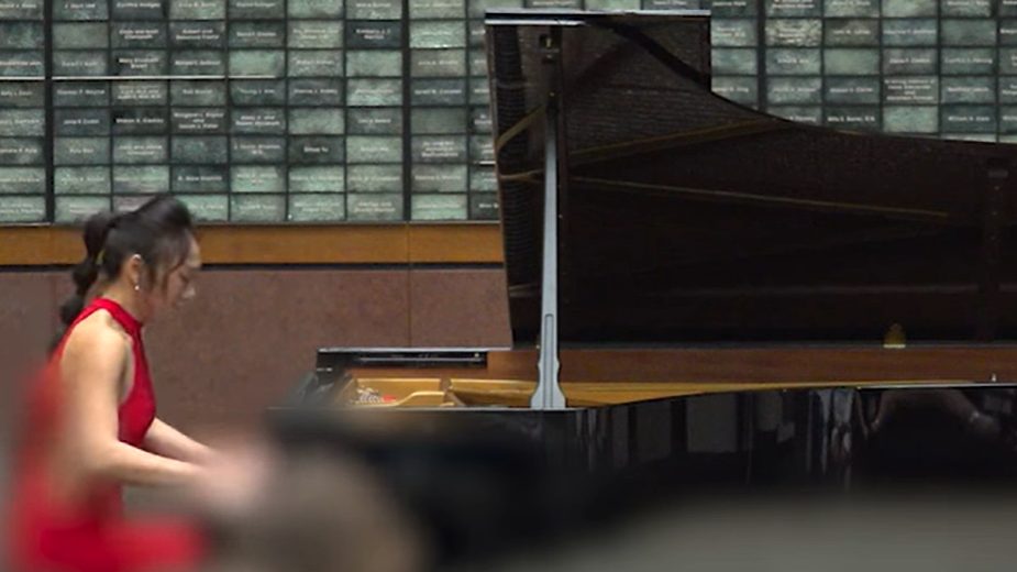 Dr. Mei Rui playing piano